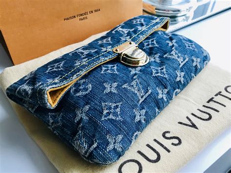 louis vuitton denim clutch.